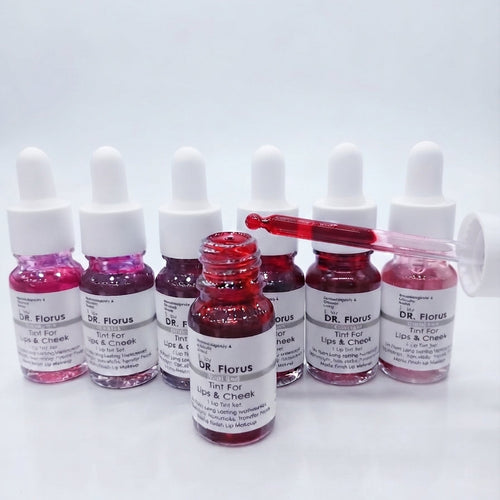 Lineup of DR. Florus Lip and Cheek Tint bottles showcasing shades with a dropper application view