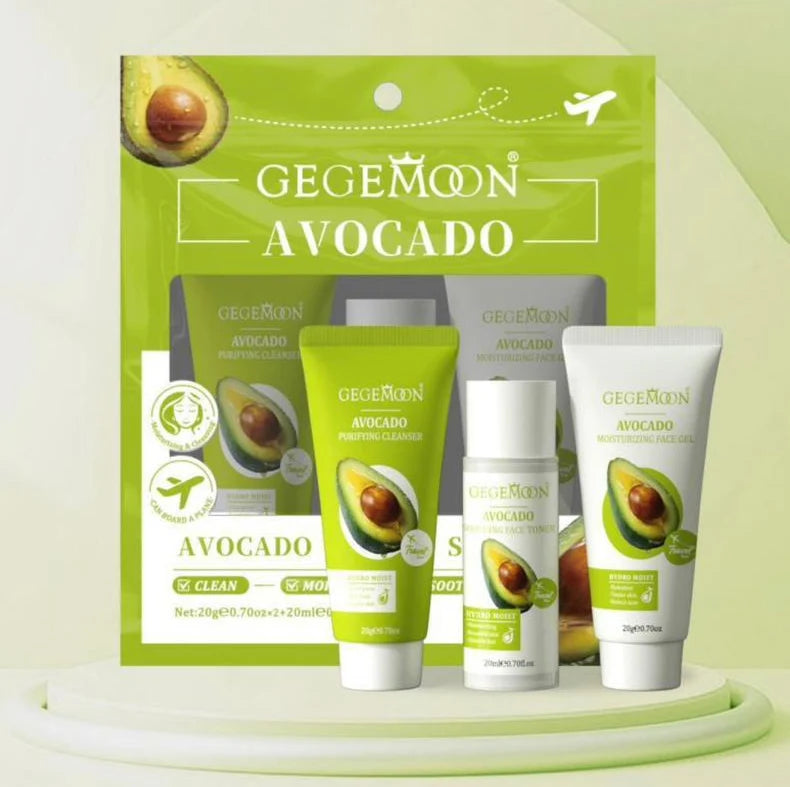 Zeeno Place GEGEMOON Avocado 3-Piece Skincare Set featuring a green pouch, cleanser, toner, and moisturizer displayed on a light green pedestal