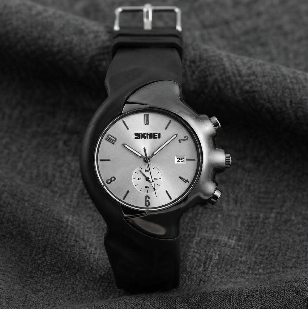 A Zeeno Place modern sports watch featuring a clean silver Arabic numeral dial, black silicone strap, and unique curved case design.