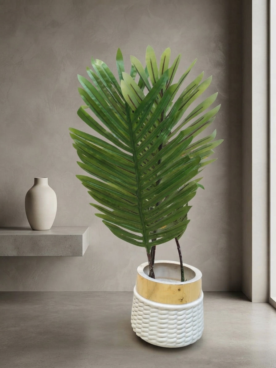 Palm artificial plant in a white and light wood textured pot for home decor